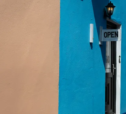 exterior commercial storefront painting with charcoal black finish