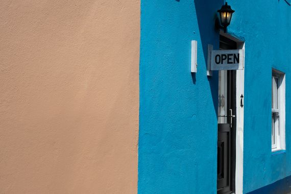 freshly painted commercial storefront exterior in charcoal black