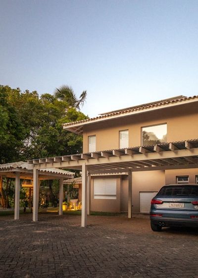 residential exterior painting - gray stucco three-car garage