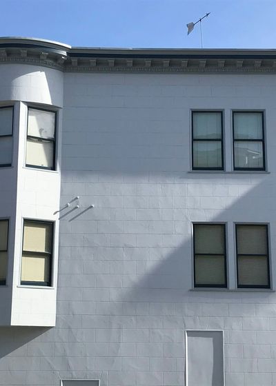 residential exterior painting - turquoise mid-century modern home