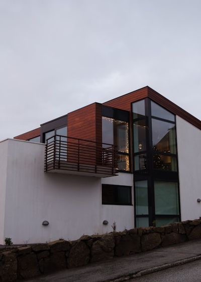 residential exterior painting - two-story gray stucco home